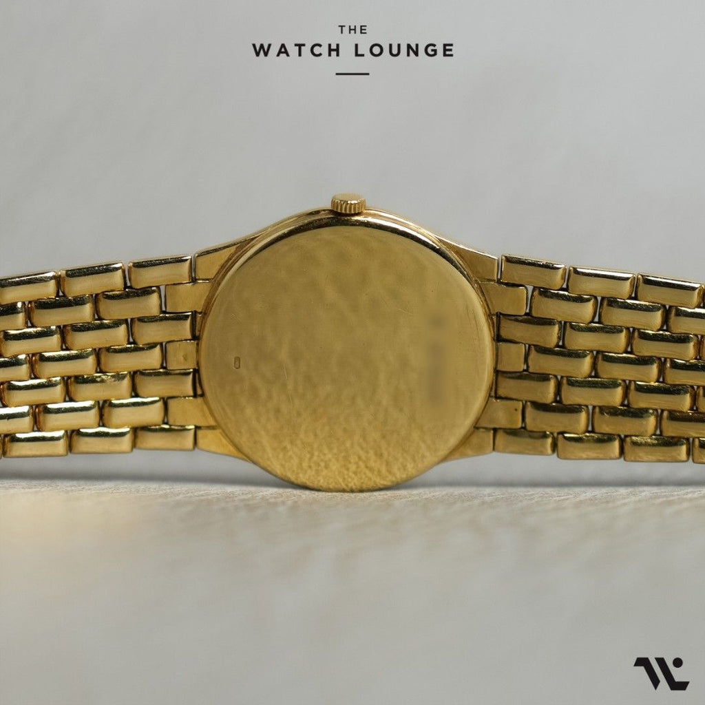 Vintage 18kt Yellow Gold Integrated Bracelet with White Dial
